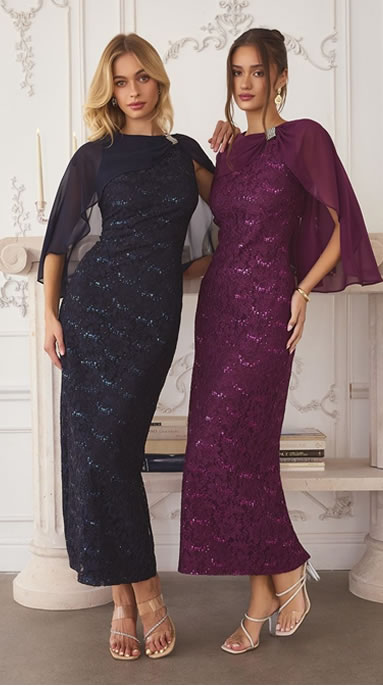 Two women stand side by side in floor-length sequin gowns with sheer cape sleeves, posing against a pale decorative backdrop.